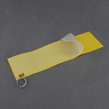 TF1246 - topná fólie PES 24 V, 30 W, lepicí, 520 na 146 mm